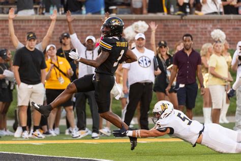 Brady Cook, Luther Burden III show No. 11 Missouri's potential in .